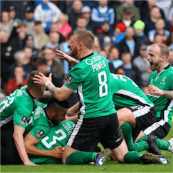 Football players celebrating goal
